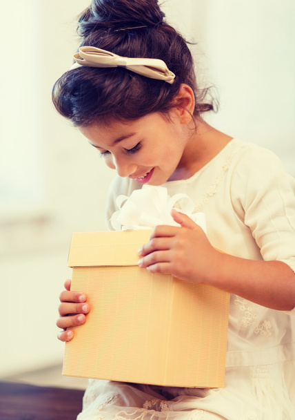 happy child girl with gift box - 写真・画像
