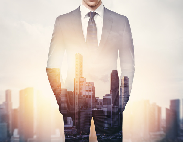 Businessman and city - Zdjęcie, obraz