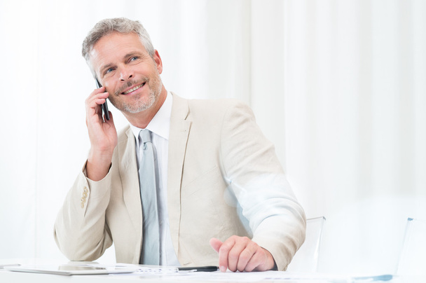 Happy Businessman Talking At Phone - Foto, immagini
