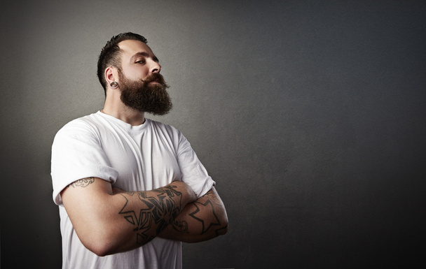 Bearded brutal man wearing  t-shirt - Valokuva, kuva