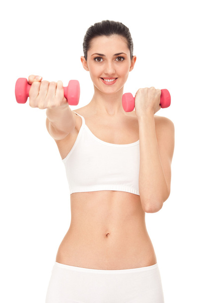Girl exercising with dumbbells - Zdjęcie, obraz