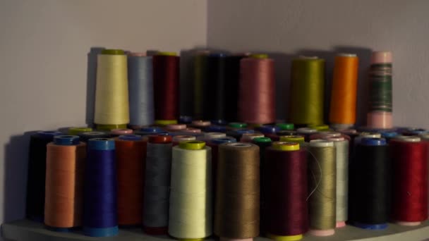 many multi-colored threads lying on the table - Footage, Video