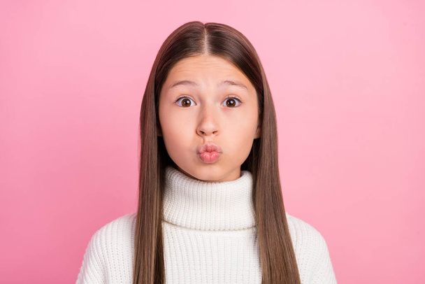 Portrait of attractive amourous flirty brown-haired girl sending air kiss isolated over pink pastel color background - Fotoğraf, Görsel