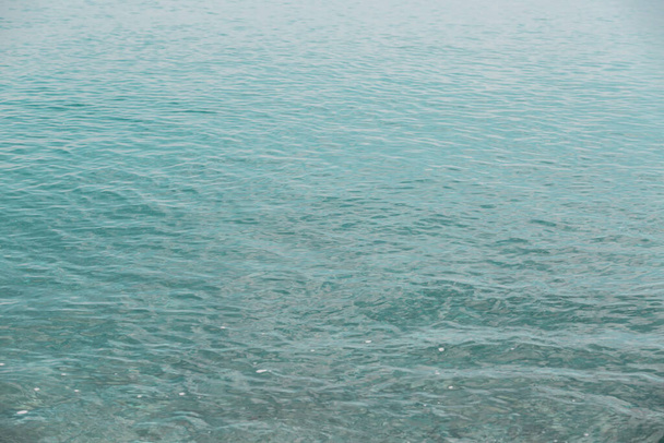 Аква морська водна поверхня. Природний фон блакитного океану, вид зверху
 - Фото, зображення