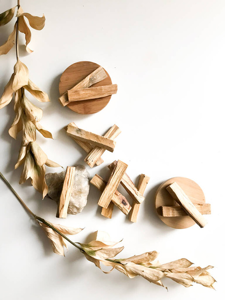 palo santo from peru, magic incense, beautiful layout of wooden blocks on a white background - 写真・画像