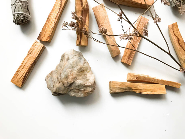 beautiful layout of palo santo and white sage, aromatherapy and incense on a white background. Place for text, religious minimalistic background - Fotoğraf, Görsel