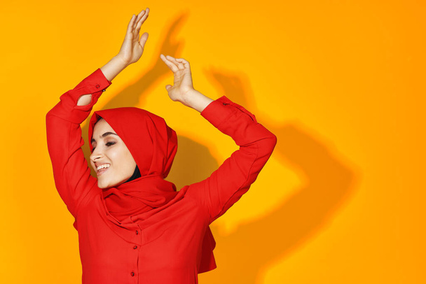 woman in red hijab posing smile fashion studio lifestyle - Fotoğraf, Görsel