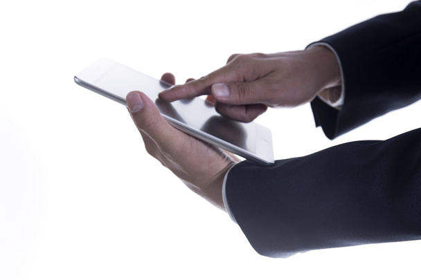 Close up hand of Business man working on digital tablet - Foto, Bild