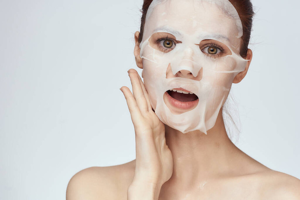 pretty woman naked shoulders face mask close-up skin care - Photo, Image
