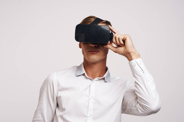 pretty man virtual reality glasses high-tech simulator technology studio - Fotoğraf, Görsel