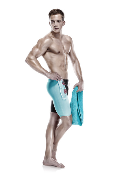 Caucasian man swimmer with goggles and towel - Photo, Image
