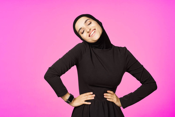 funny muslim clock technology posing pink background - Photo, image