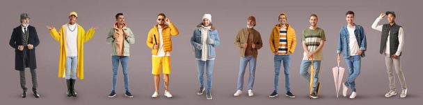 Grupa stylowych mężczyzn w jesiennych ubraniach na szarym tle - Zdjęcie, obraz