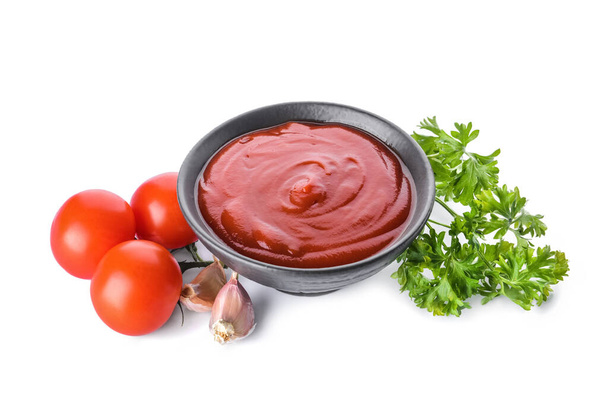 Bowl with organic tomato sauce on white background - Photo, Image