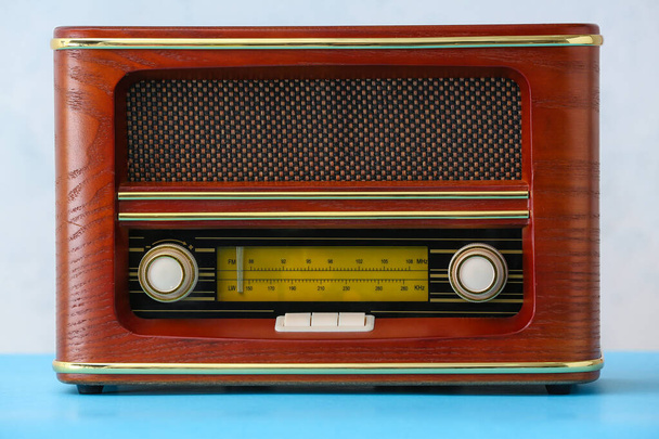 Retro radio receiver on light background - Photo, Image