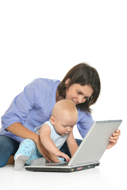 Mother and little son with laptop - Fotó, kép