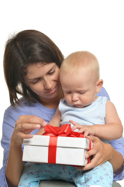 Mother with baby opening present - Foto, immagini