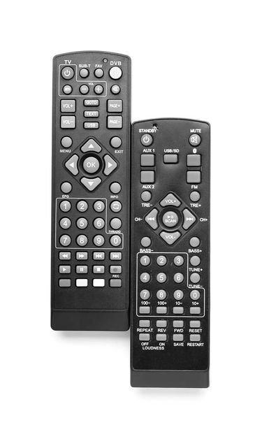 Black TV remote controllers on white background - Photo, Image