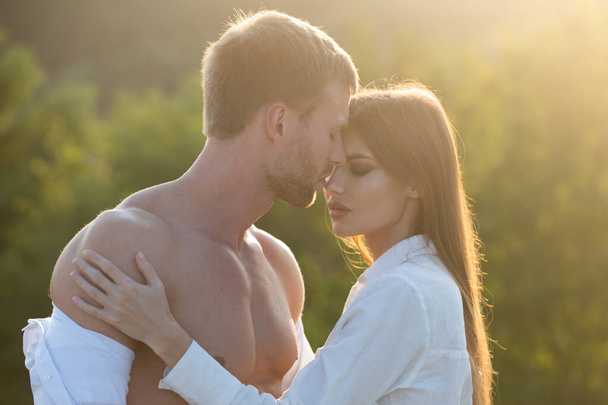 Couple in love. Young sensual couple hugging, love romance concept. - Foto, afbeelding