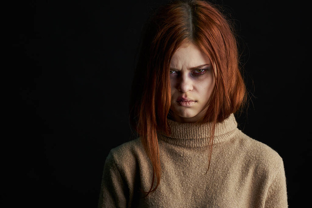 red-haired woman with bruises under her eyes scared crying depression - Photo, image