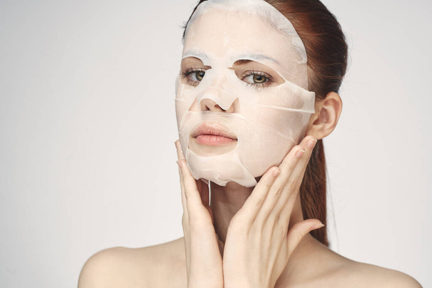 mujer en máscara cosmética facial cuidado de la piel rejuvenecimiento - Foto, Imagen