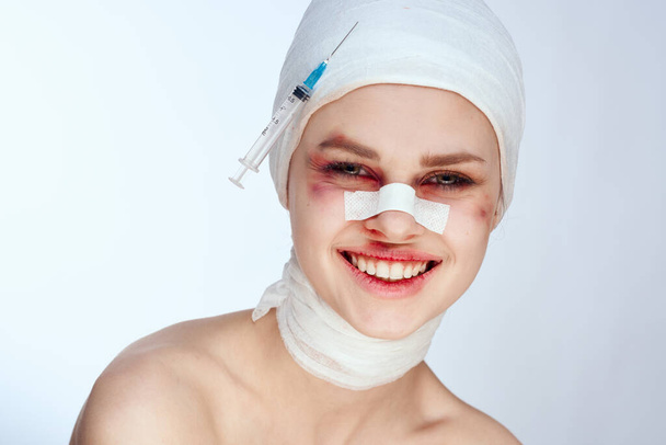 emotional woman bruised face medicine treatment injury isolated background - Φωτογραφία, εικόνα