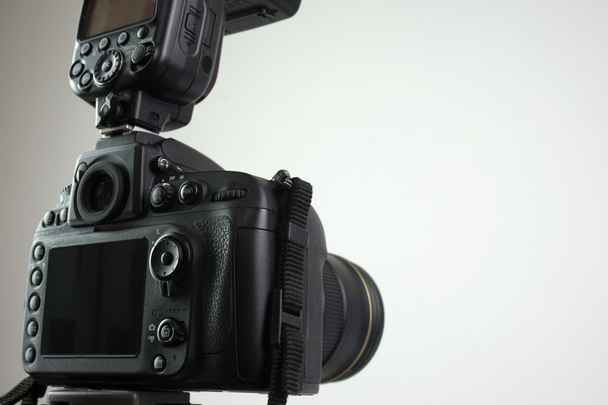DSLR camera with external flash - Фото, зображення