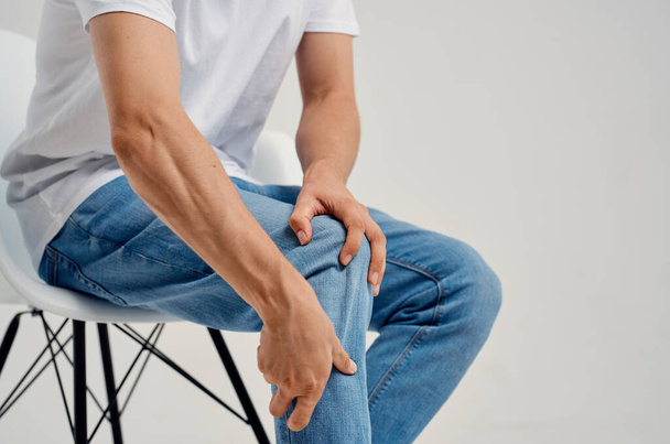 man holding his leg health problems pain injury. High quality photo - Foto, immagini