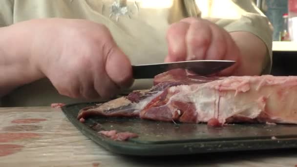 the chef cuts raw meat  - Footage, Video