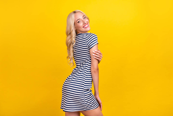Profile side portrait of attractive cheerful girl having fun posing copy space isolated over bright yellow color background. - Fotografie, Obrázek