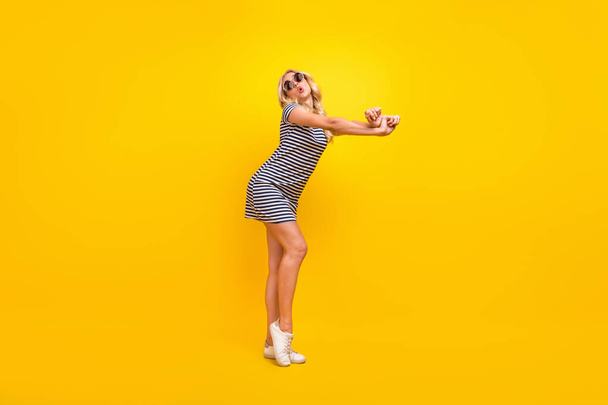 Full length body size photo dancing woman wearing sunglass dress isolated vibrant yellow color background. - Φωτογραφία, εικόνα