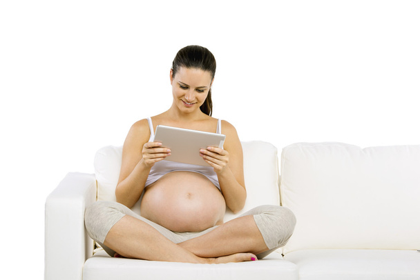 Pregnant woman using digital tablet - Fotografie, Obrázek