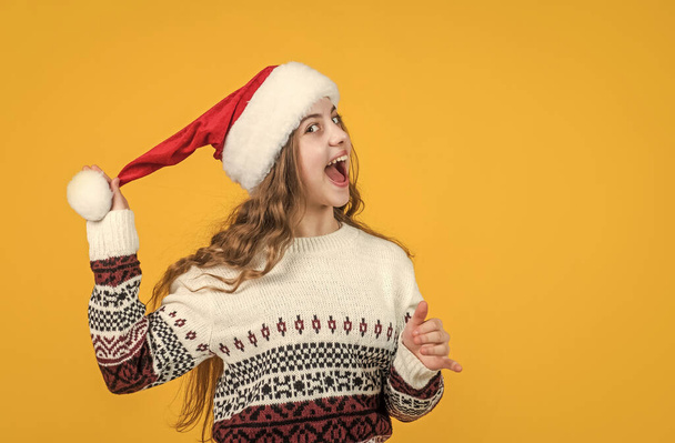 happy new year teen girl wear red santa claus hat feel surprise, surprise - Valokuva, kuva