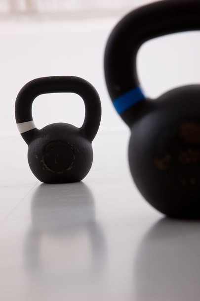 Two black iron kettlebell for weightlifting and fitness - Photo, Image