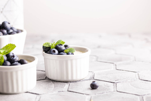 Sweet dessert vanilla panna cotta with blueberries - Zdjęcie, obraz