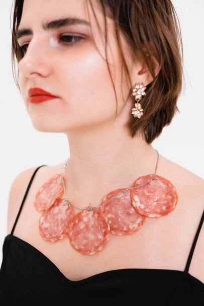 salami neckline on the girl - Φωτογραφία, εικόνα