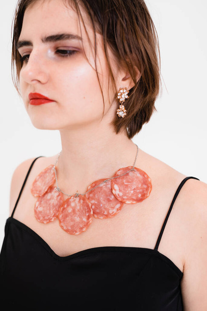 salami neckline on the girl - Φωτογραφία, εικόνα