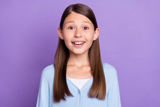 Photo of hooray brunette small girl wear blue shirt isolated on violet color background - Fotoğraf, Görsel