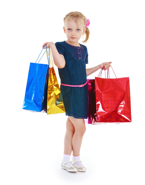 Girl bags of different colors on a white background. - 写真・画像
