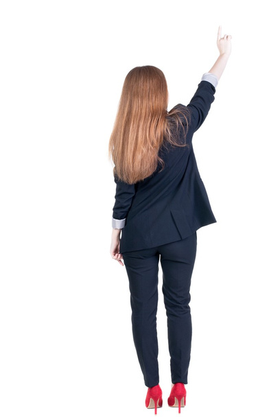 Pointing woman back view - Фото, изображение