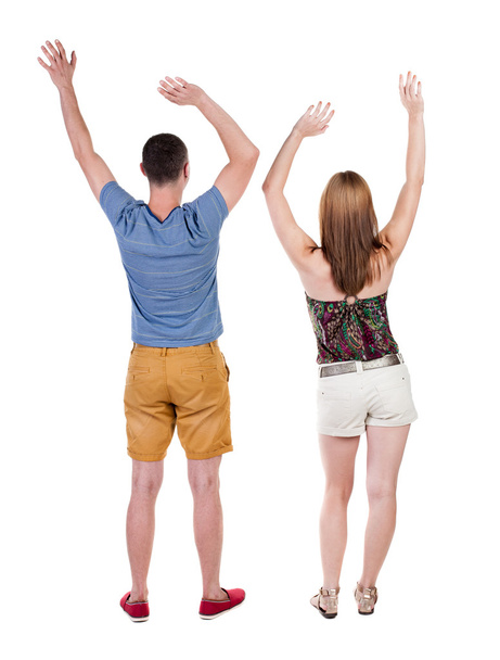 Couple celebrating victory hands up. - Foto, afbeelding