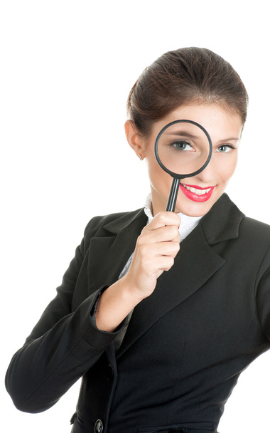 Businesswoman with magnifier - Foto, afbeelding