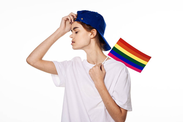 girl in white t-shirt lgbt flag transgender posing light background - Photo, image