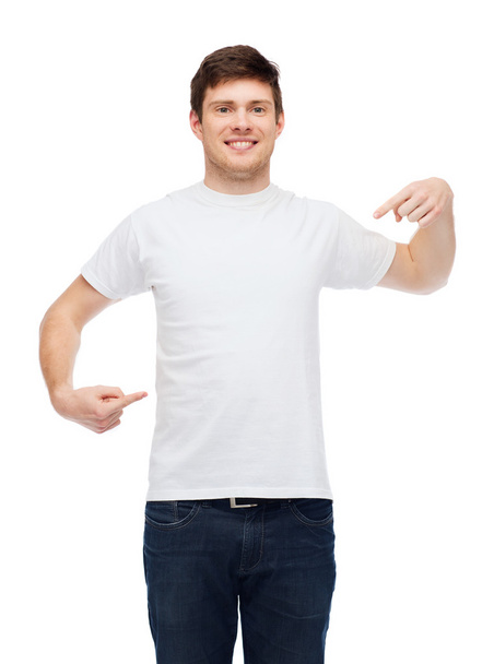 smiling young man in blank white t-shirt - Photo, Image