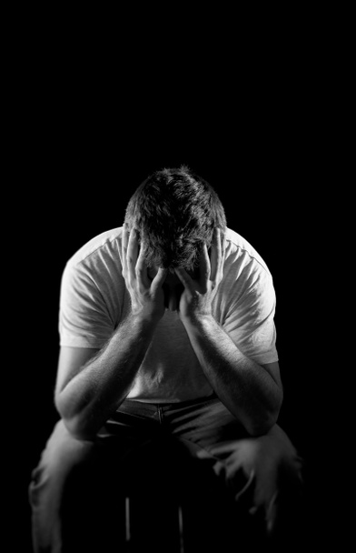 desperate man suffering emotional pain, grief and deep depression - Photo, Image