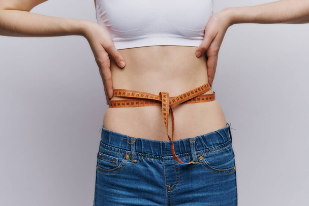 woman measure waist slim figure diet lifestyle - Foto, Imagen