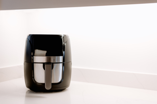 Air fryer on the worktop - Photo, image
