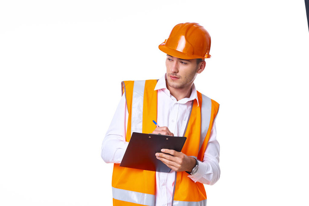 man in orange hard hat engineer work professionals construction - Zdjęcie, obraz
