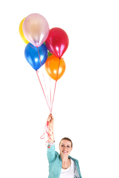 woman with balloons over white background smiling - Fotó, kép