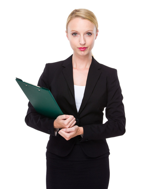 Caucasian businesswoman with clipboard - Zdjęcie, obraz